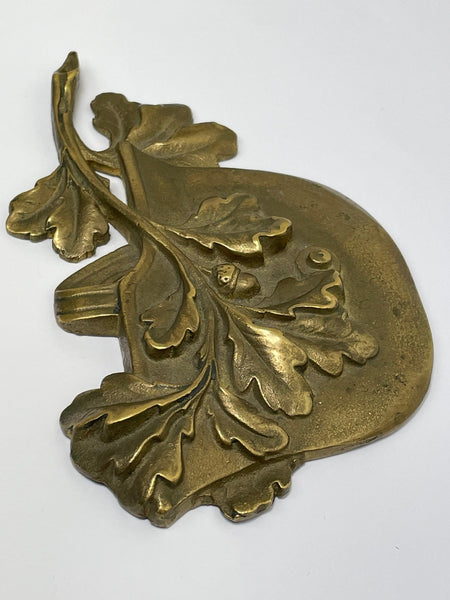 Small Military WW2 Brass Plaque Form German Helmet With Oak Leaves - Cheshire Antiques Consultant